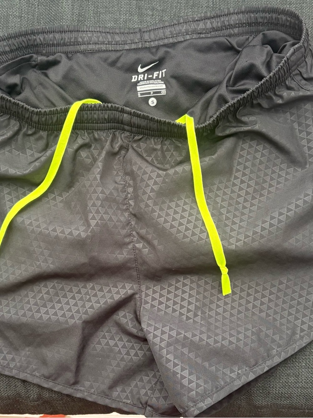Nike Women’s Black Athletic Shorts with Neon Yellow Drawstring